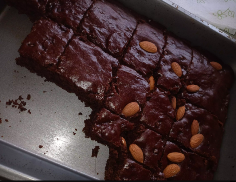 Freshly baked vegan brownies on a rustic table setting