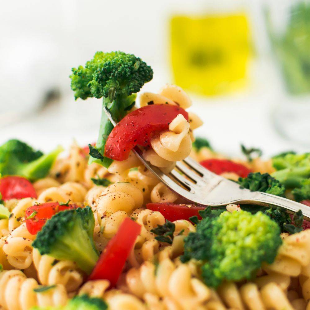 Bowl of nutritious pasta salad highlighting calorie content